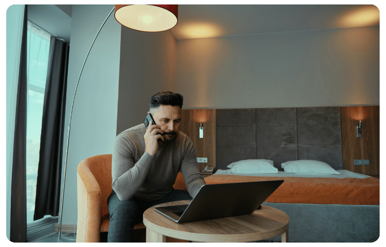 Caxton-Business-NEWWEB-CardFrame-man-in-hotel (2)